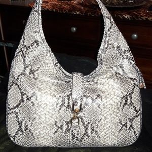 NWT..G.I.L.I. handbag never used